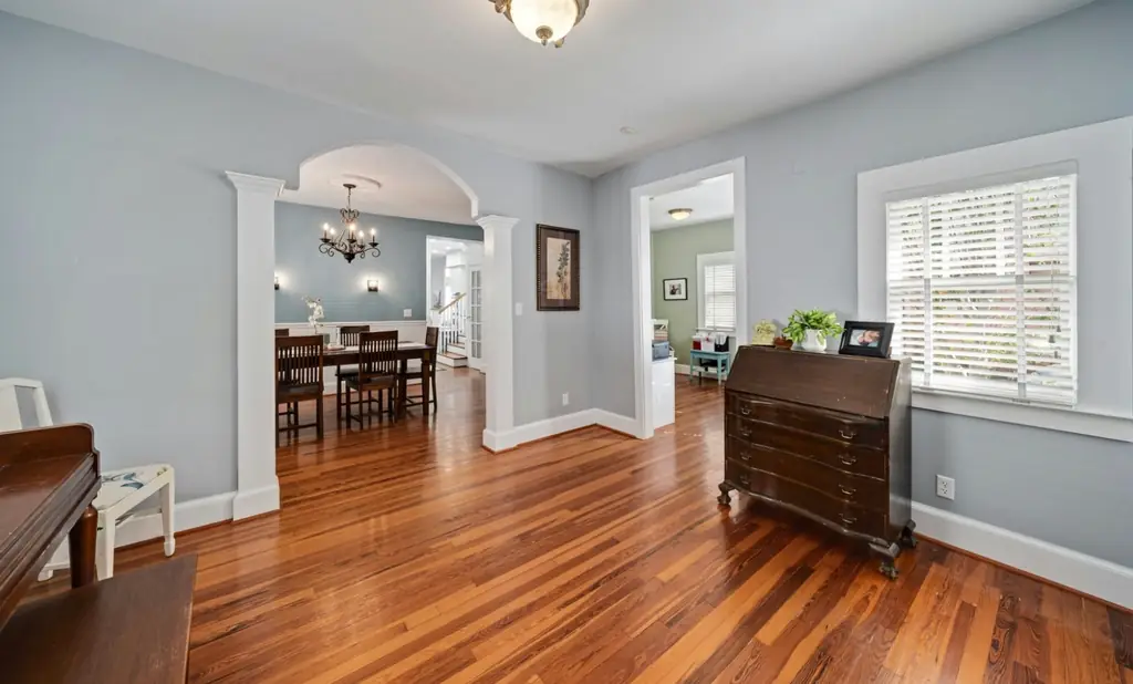 Dining room and foyer with refinished hardwood flooring